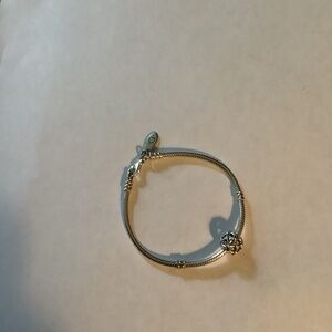 Pandora sterling silver bracelet with bead charm